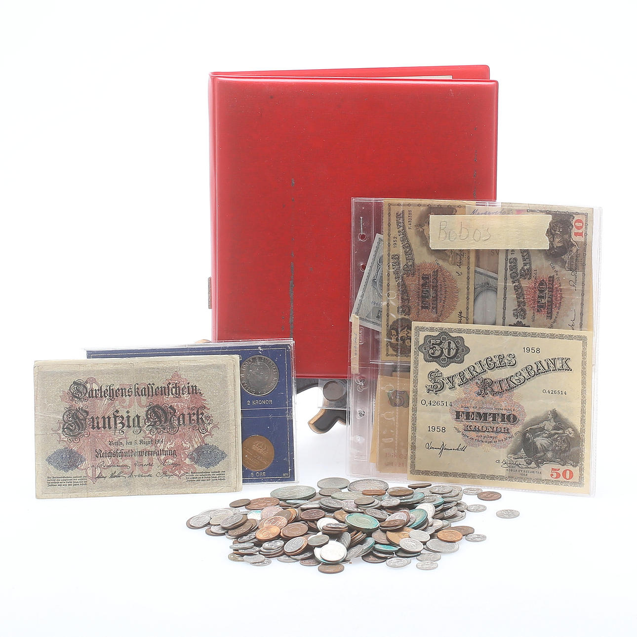 MYNT samt SEDLAR, Sverige samt Tyskland, 1900-tal, silvermyntens vikt 194 gram.