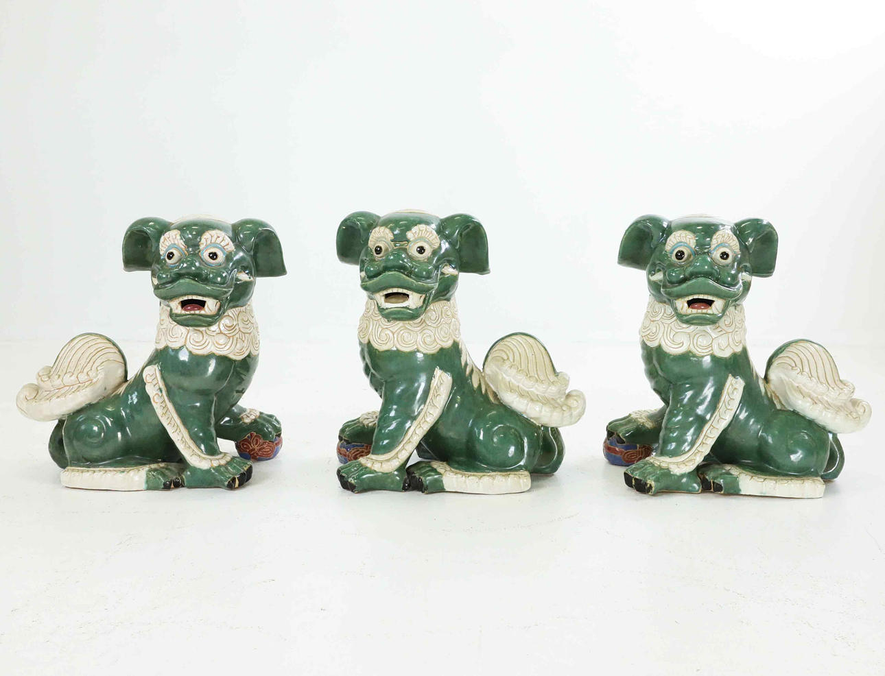 Three Chinese temple dogs, 20th century.