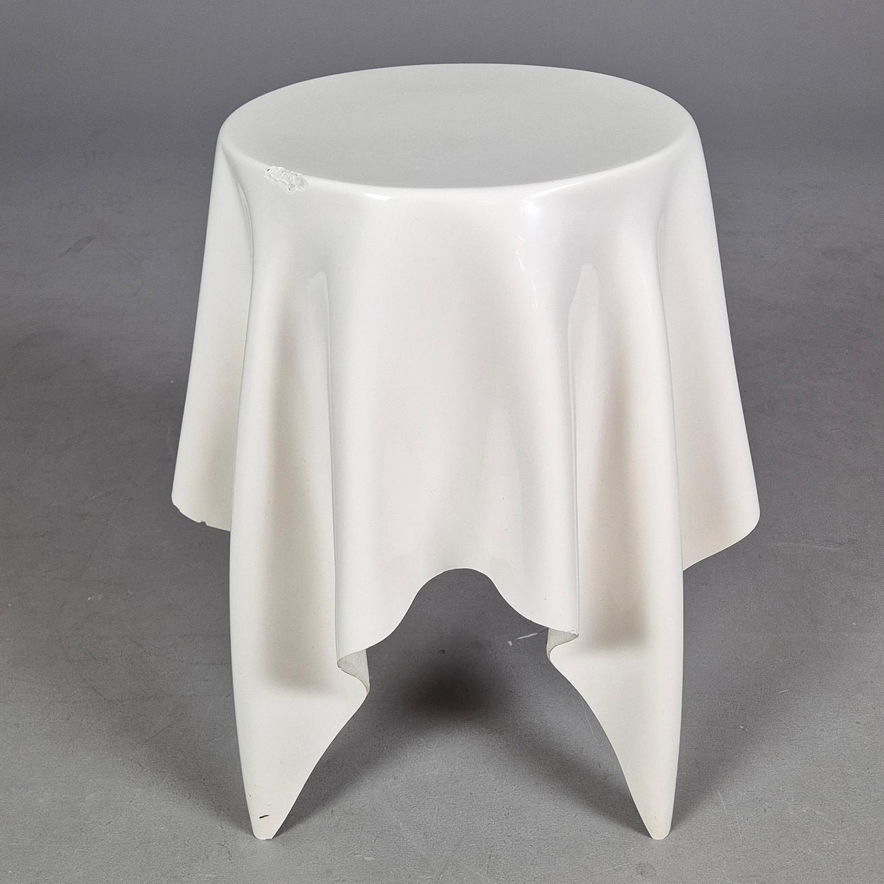 A FIBERGLASS 'HANDKERCHIEF' SIDE TABLE.