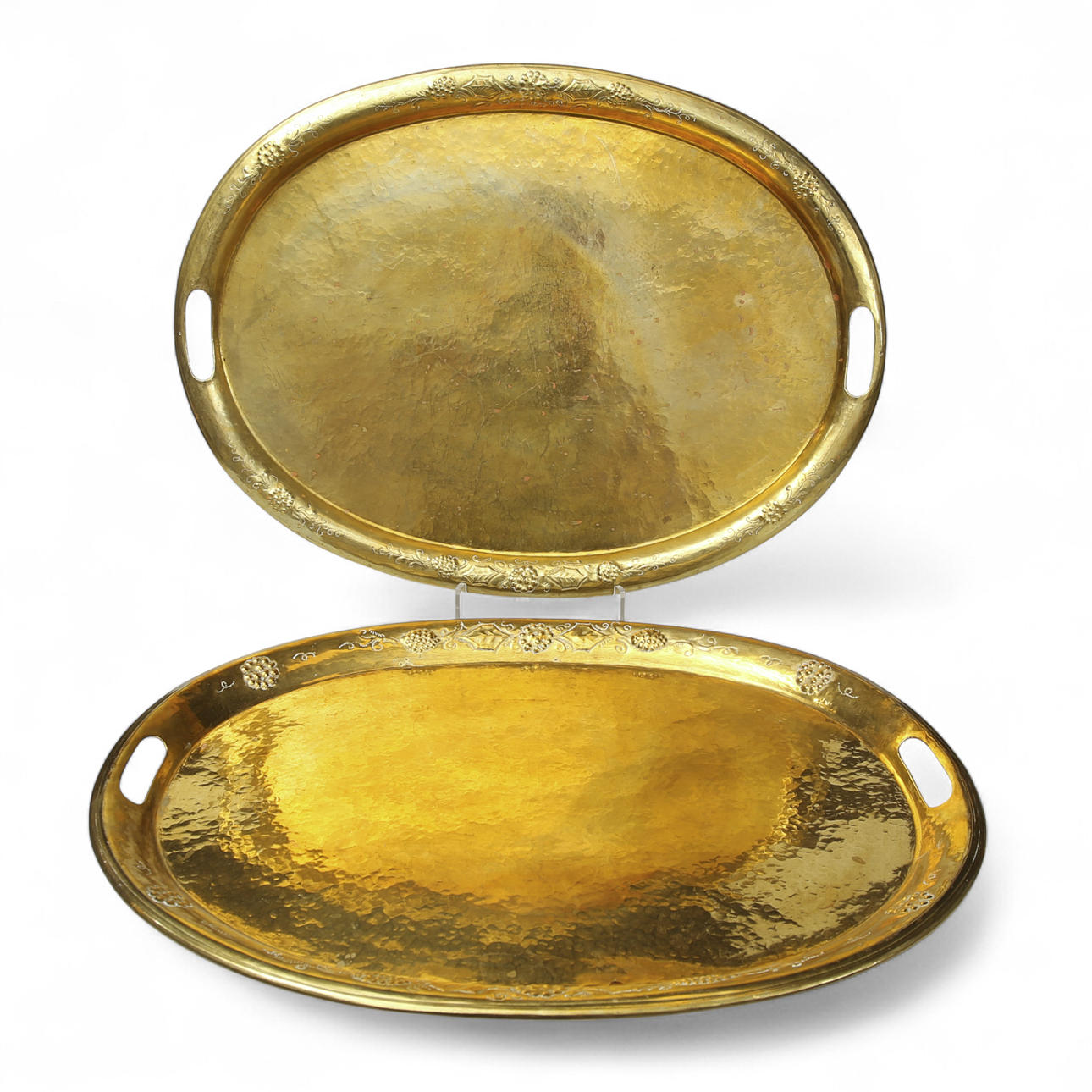 SERVING TRAYS with handle, brass, a pair.