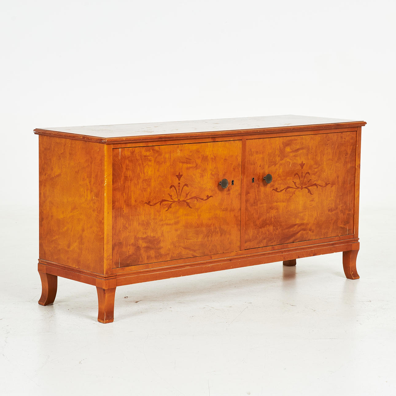 SIDEBOARD. Mid-20th century, veneered with birch.