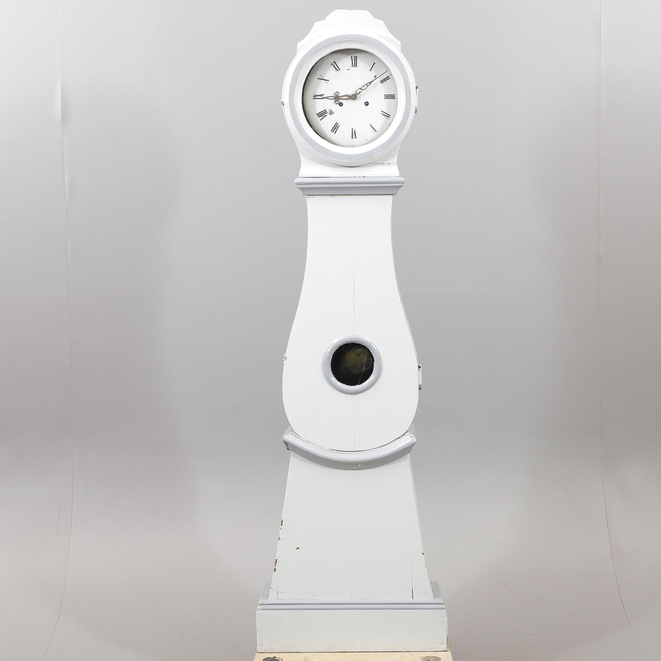 A 19th-century repainted floor clock.