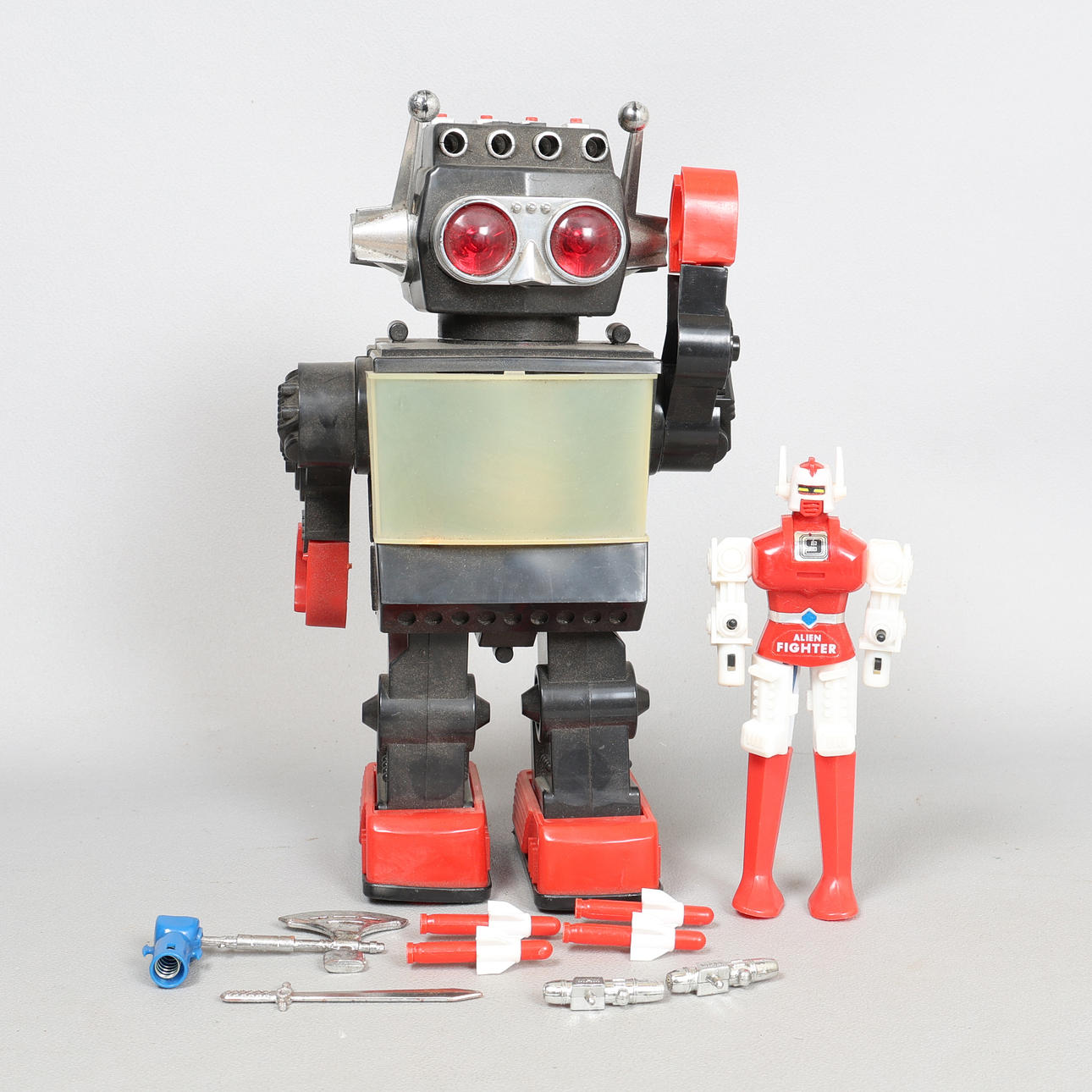 KAMCO. A 13" BATTERY OPERATED SATURN ROBOT & A GOBOTS FIGURE (2).