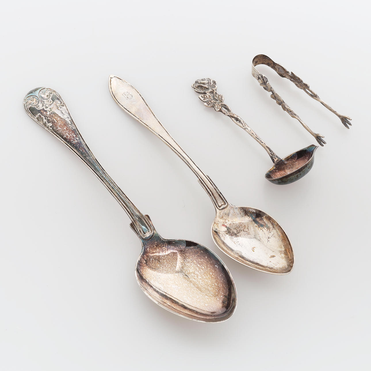 SILVER OBJECT, 4 pieces, weight 126 grams.