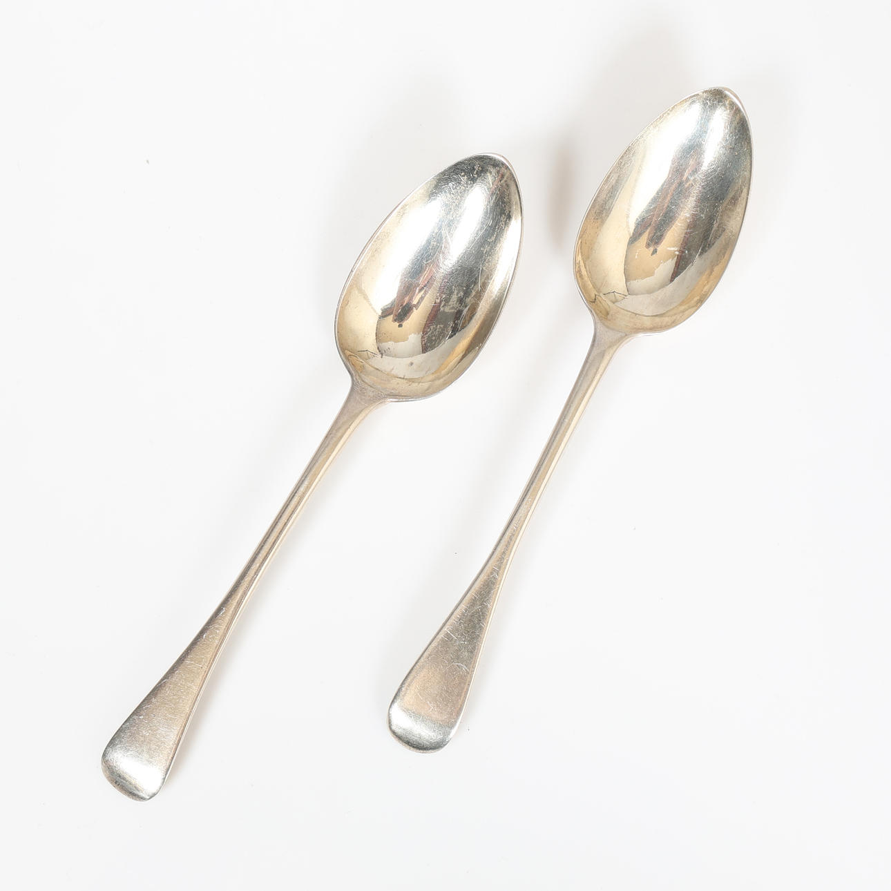 TWO VICTORIAN SILVER TABLE SPOONS (2).
