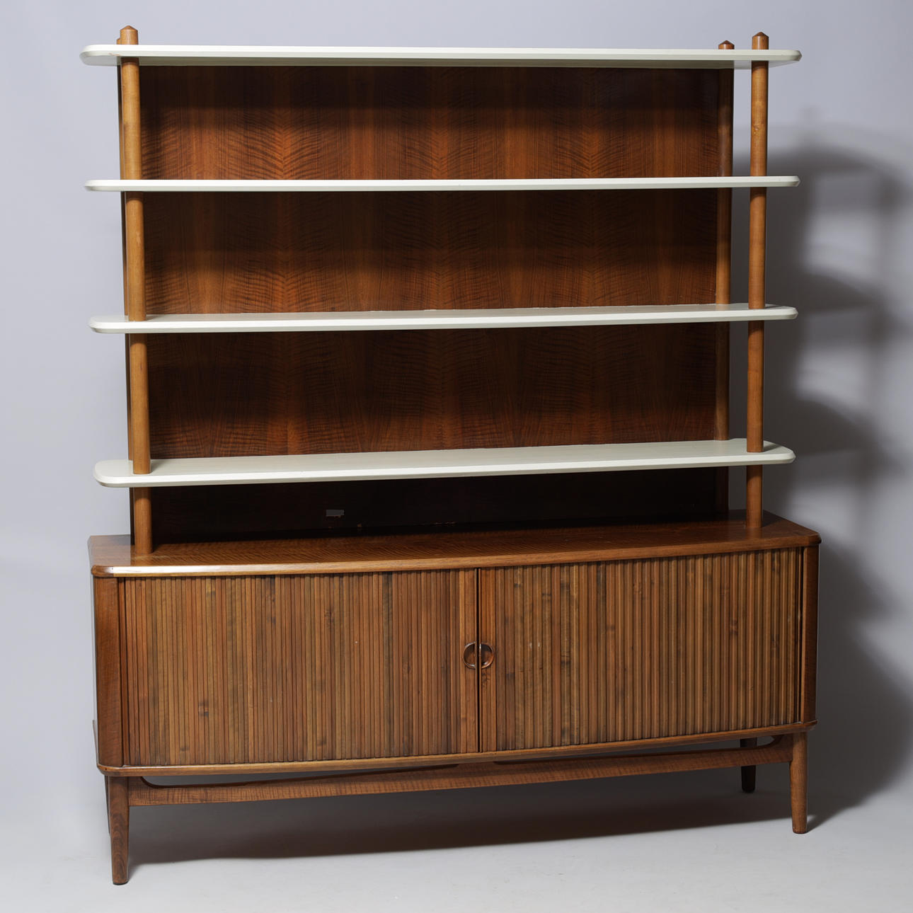 KURT OLSEN. Walnut sideboard with two jalousie lids and upper shelf of stained beech, Andersen & Bohm, Denmark, mid 1900's.