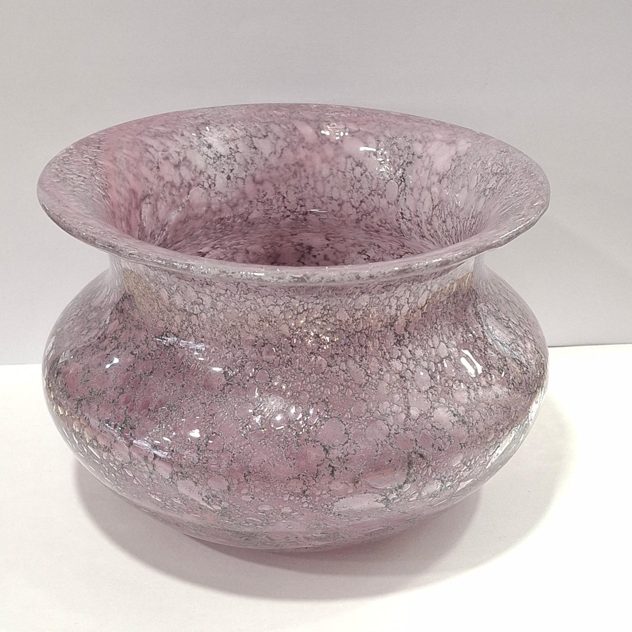 Center in pink glass.