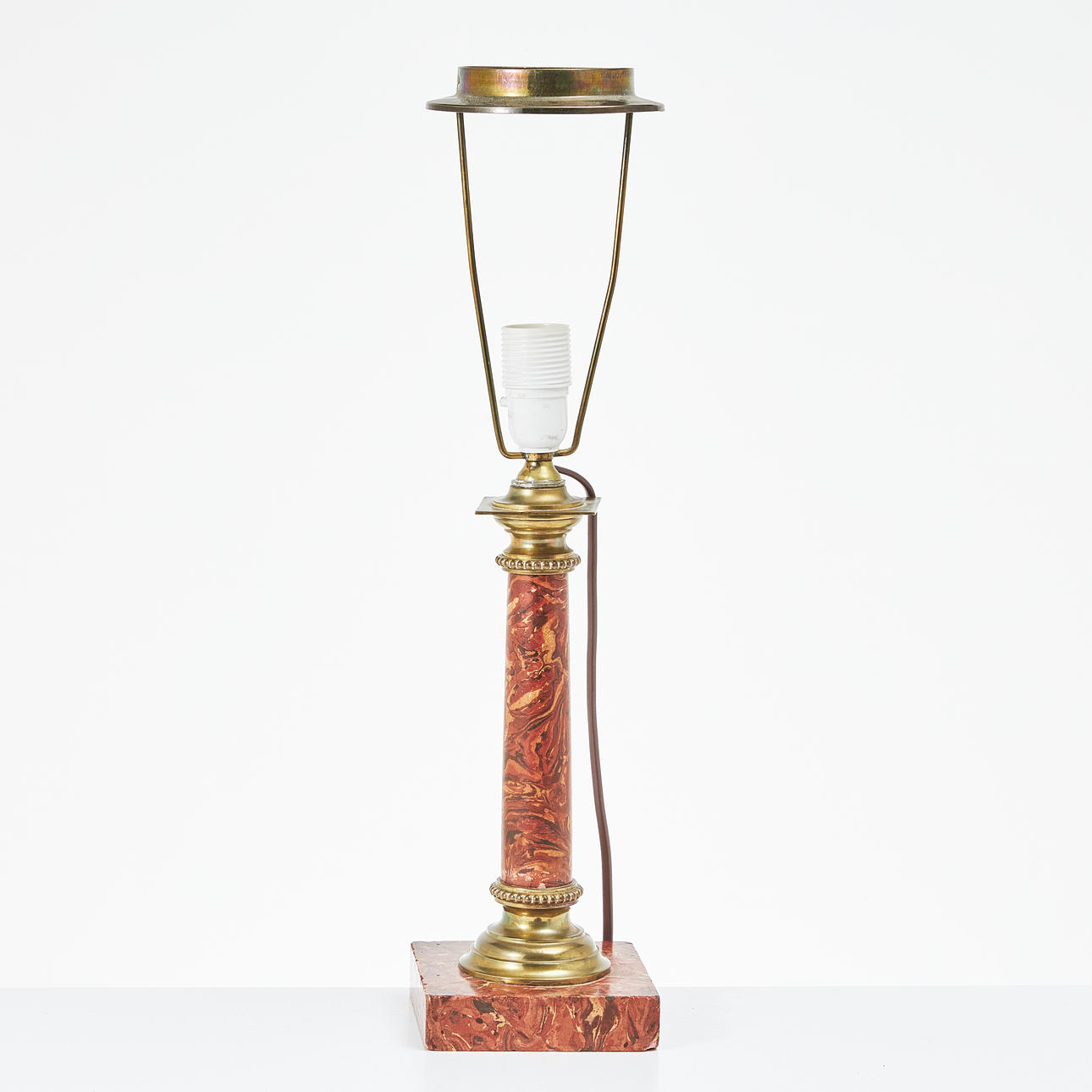 A porphyry imitation table lamp, first half of the 20th century, columnar column, brass details.