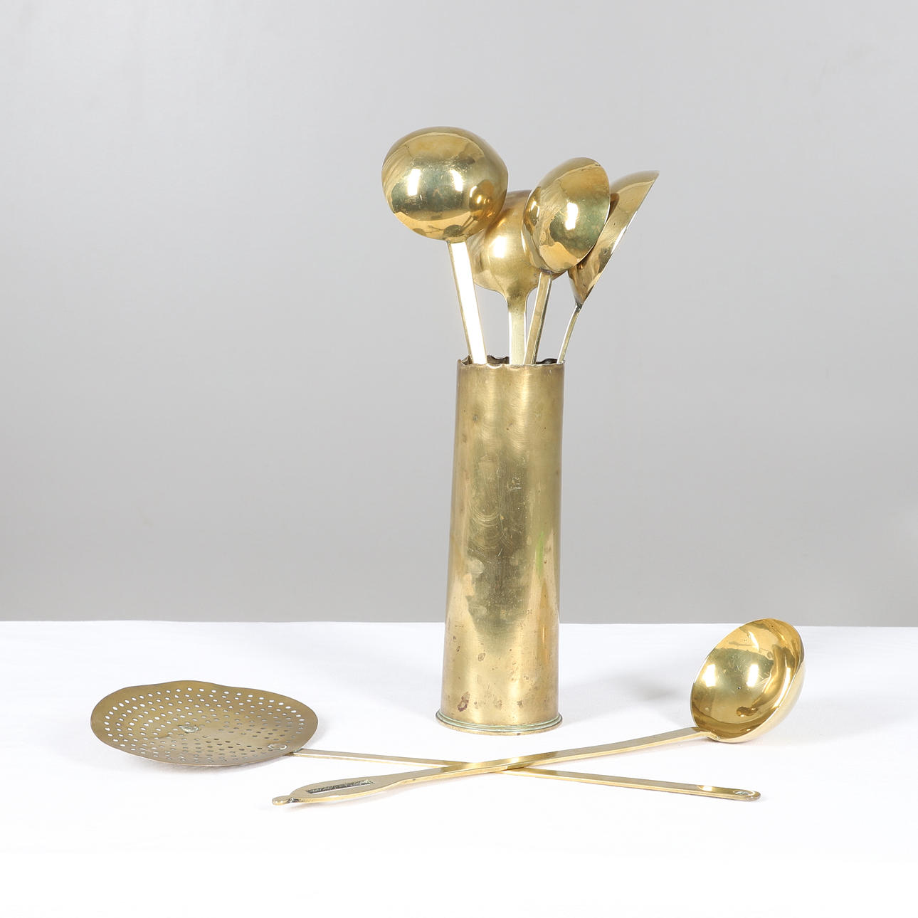 FIVE BRASS LADLES, A BRASS SKIMMER ETC.