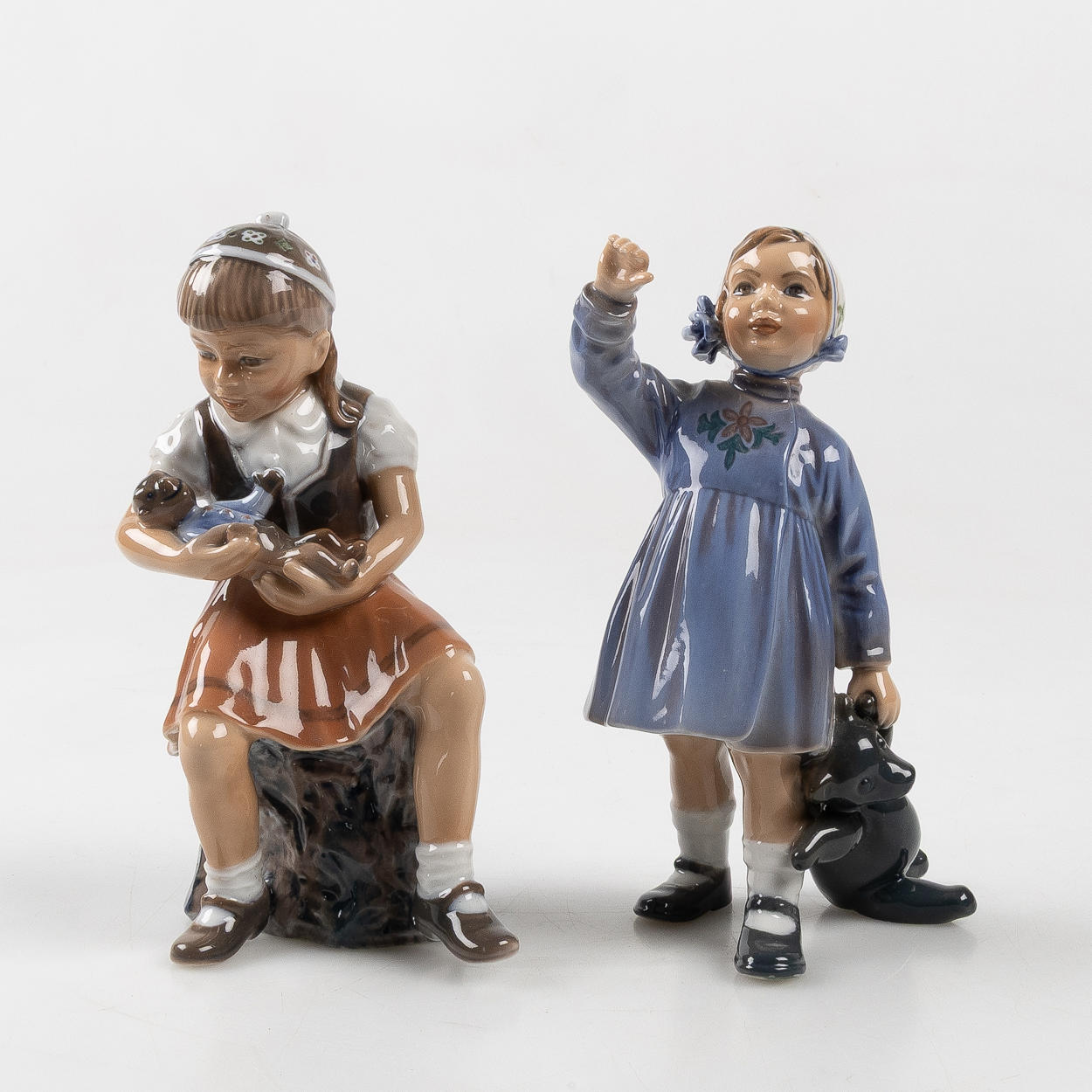 Two porcelain figurines, Dahl Jensen, Denmark.