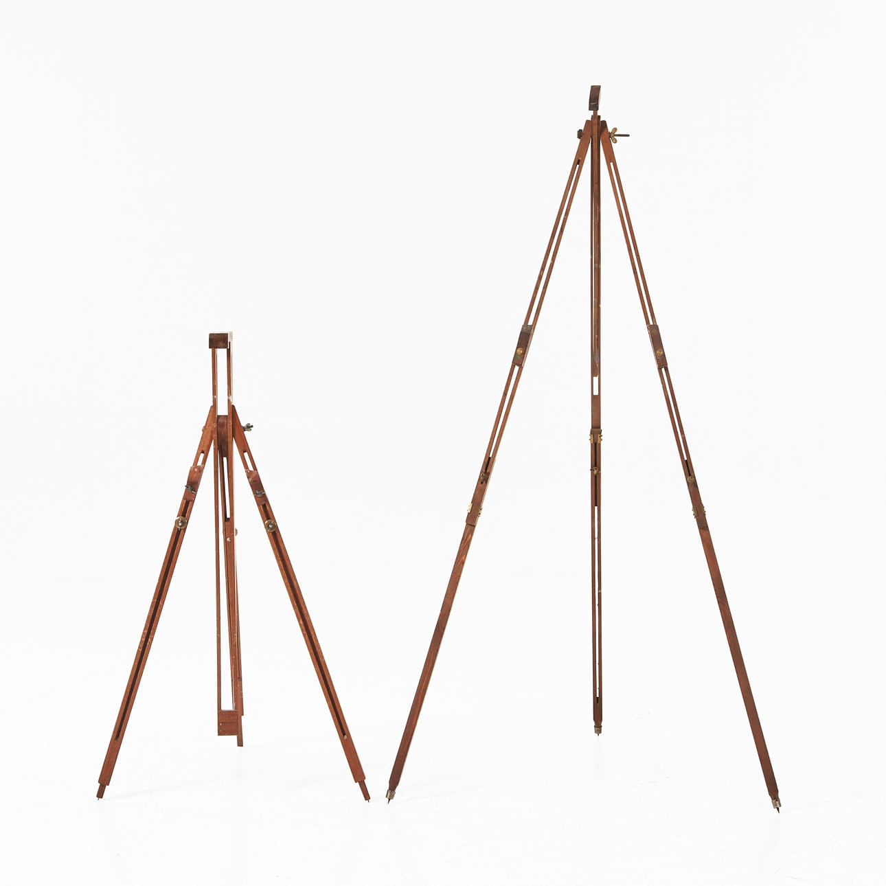 Two second half 20th century easels, dark stained.