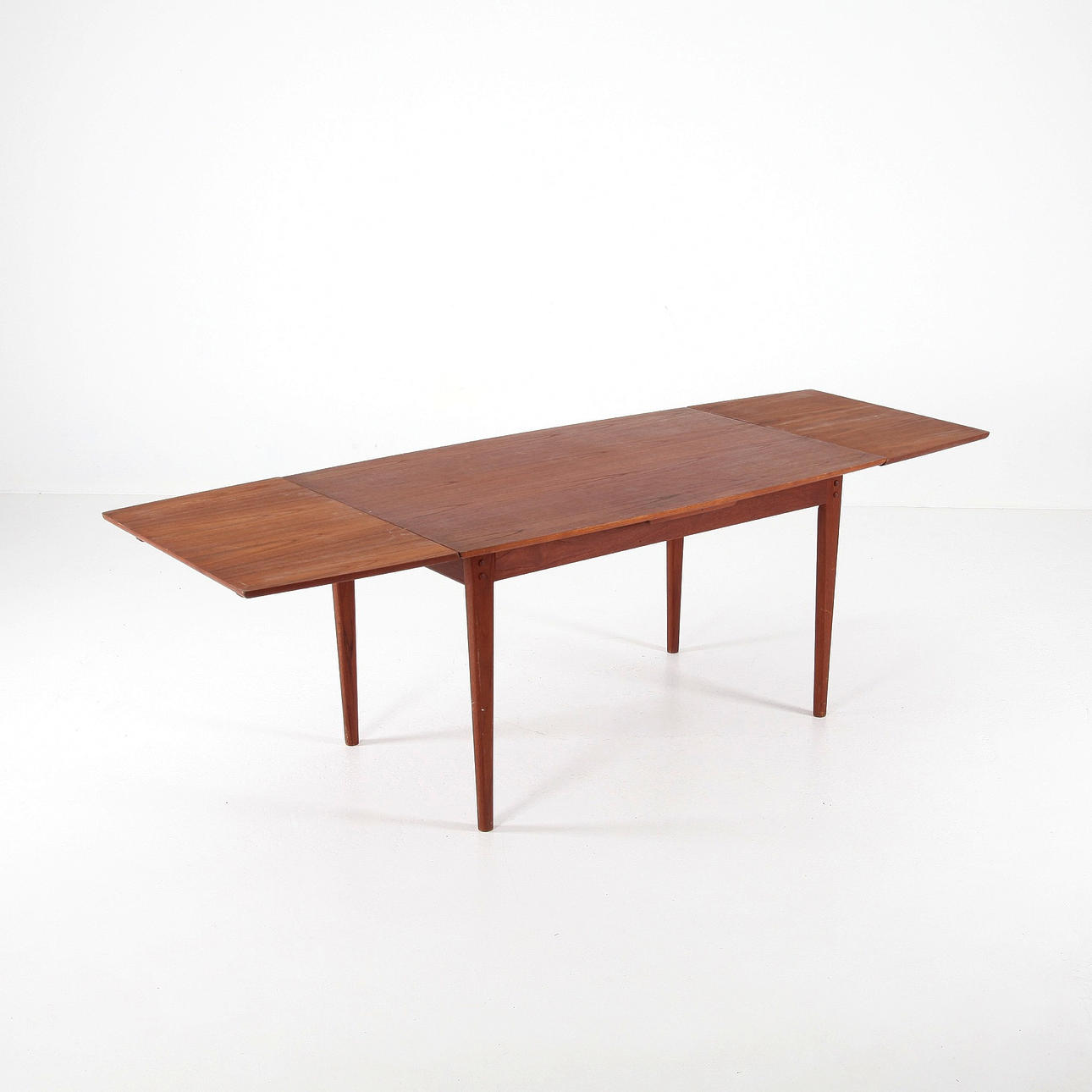 DINING TABLE WITH PULL-OUT PLATES, teak, 235 cm long, Denmark 1950/60s.