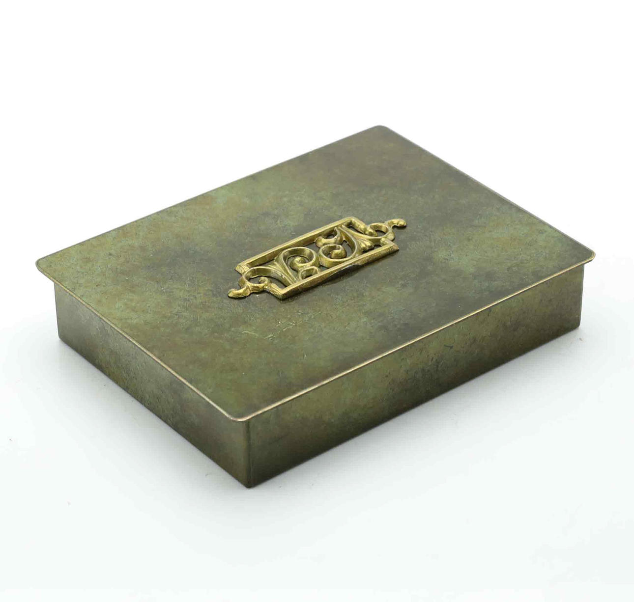 Case, bronze patinated, brass relief decor, 1930s.