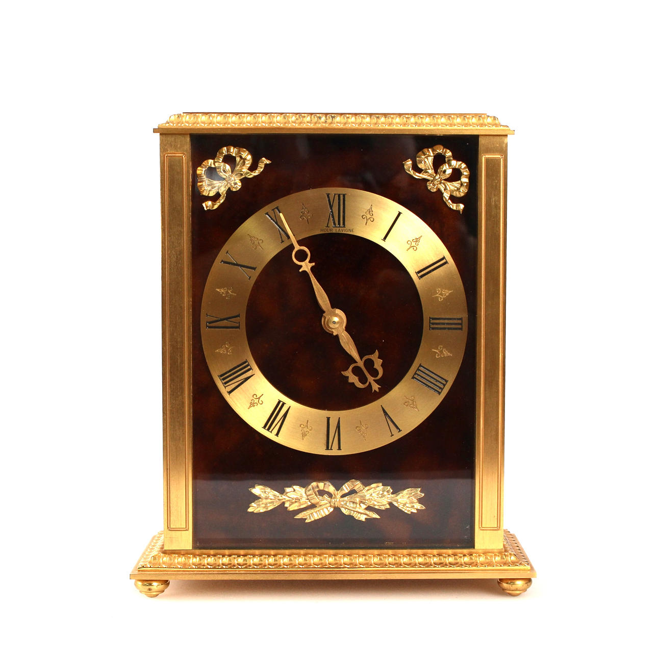 A bronze table clock, “Hour Lavigne”. 20th century.
