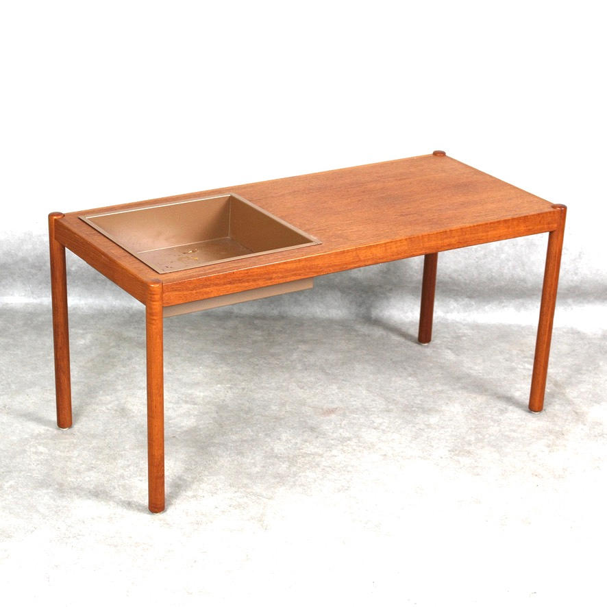 A teak flower table, 1960s/70s.