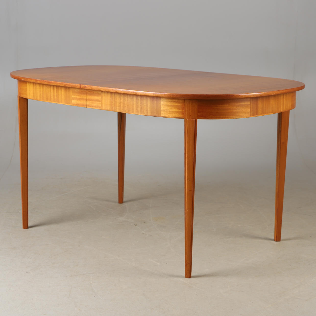 CARL MALMSTEN. Dining table, walnut, mid 20th century, branded.