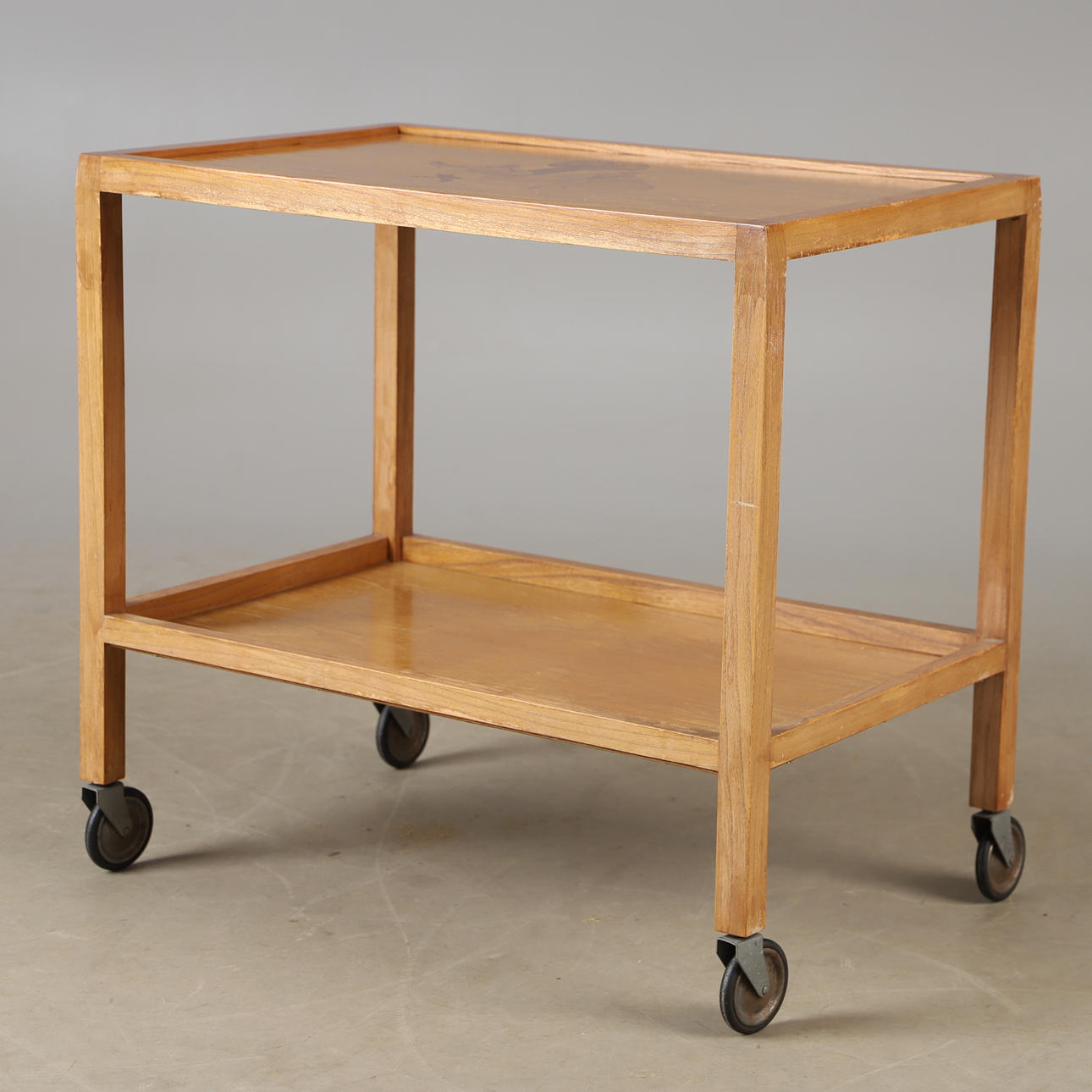 A serving trolley, elm with intarsia, 1940s.