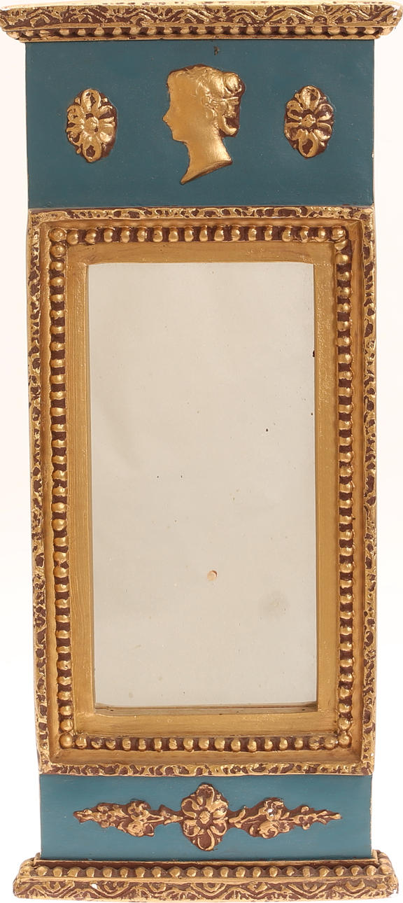 A 20th century Empire style mirror.