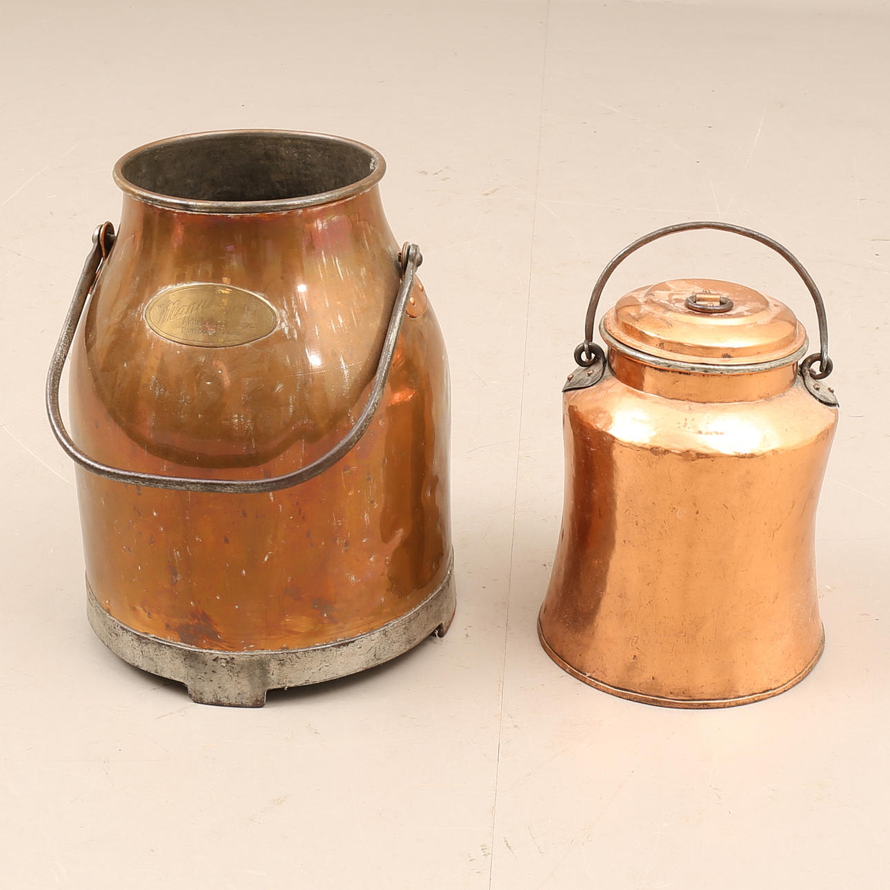 A pair of copper objects, 20th century.