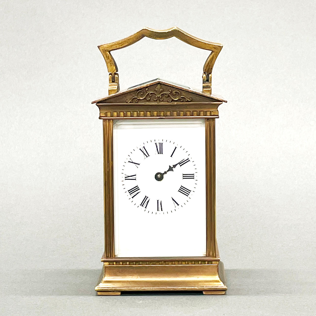 FRENCH BRASS CARRIAGE CLOCK.