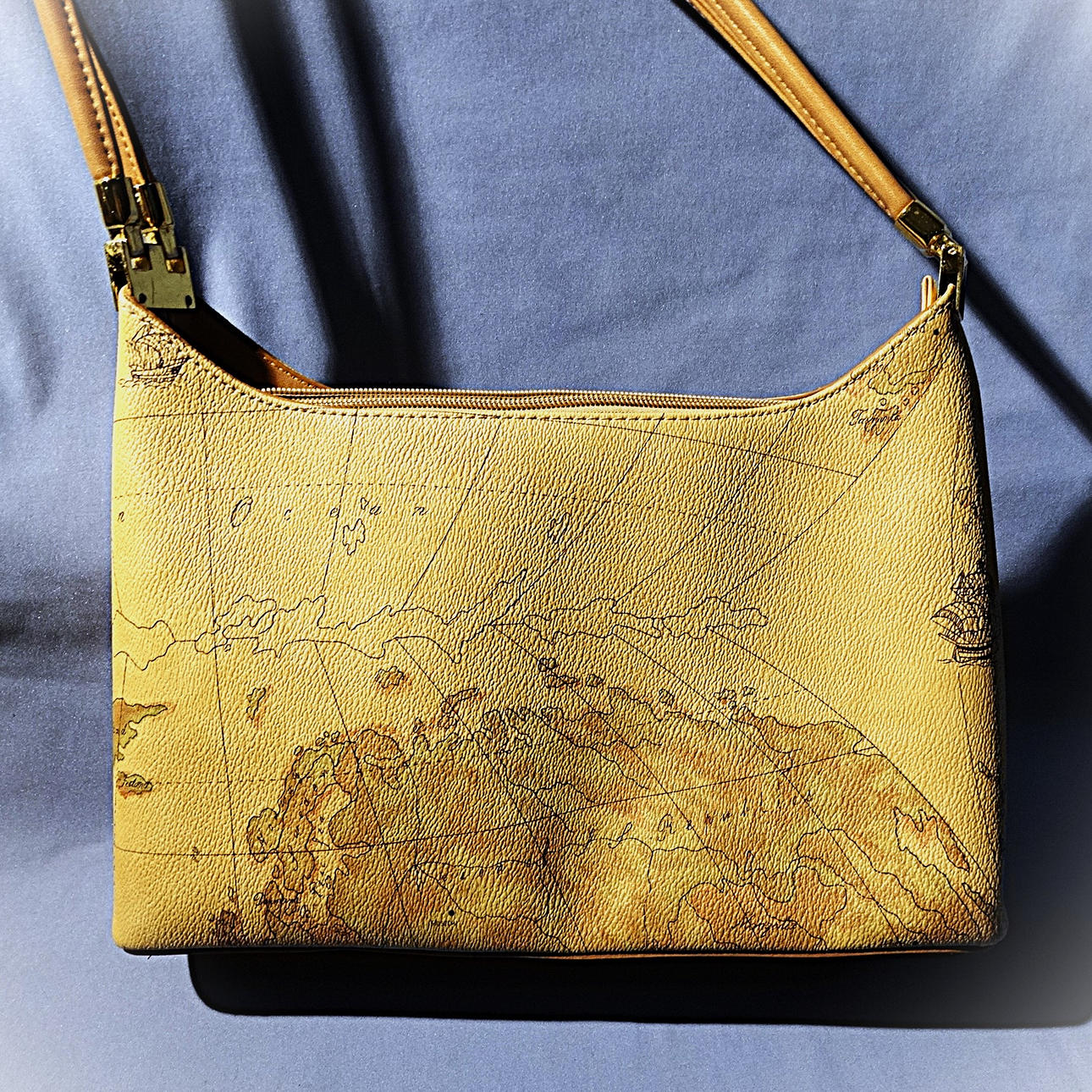 HANDBAG with map motif print.