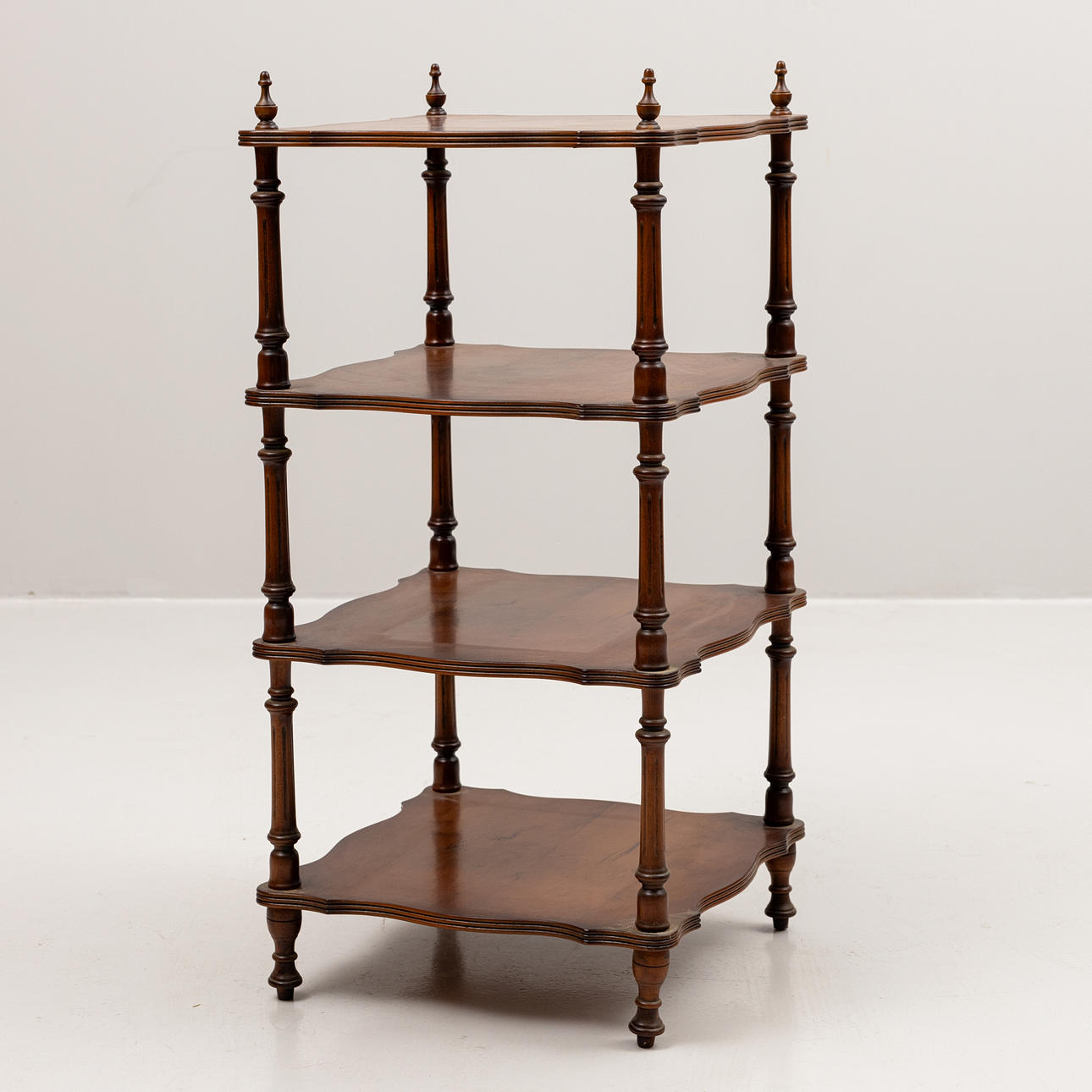 A mahogany etienne shelf.