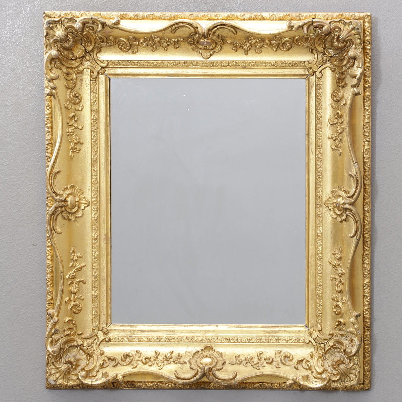 A mirror, gilt frame, 20th century.