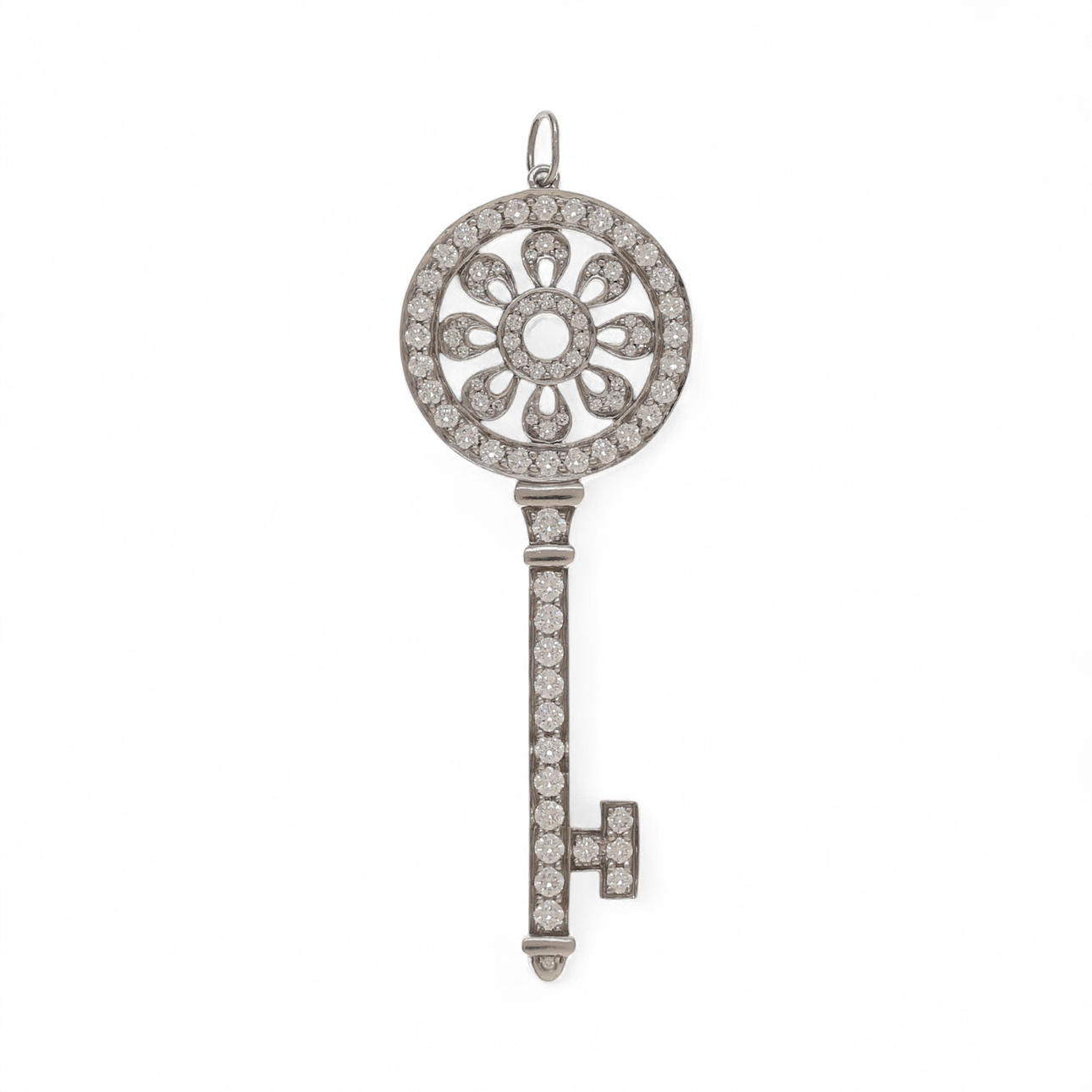TIFFANY & CO. Petal-shaped key pendant.