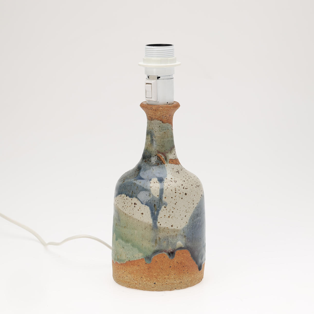 GERDA ØSTERGAARD. Table lamp made of partly glazed stoneware, own workshop, signed, Denmark, second half of the 20th century.