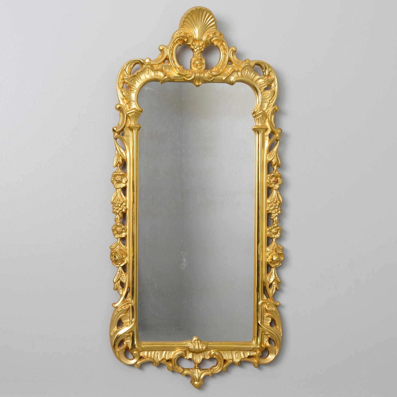 A rococo style mirror, gilt, AB Exportlist, 20th century.