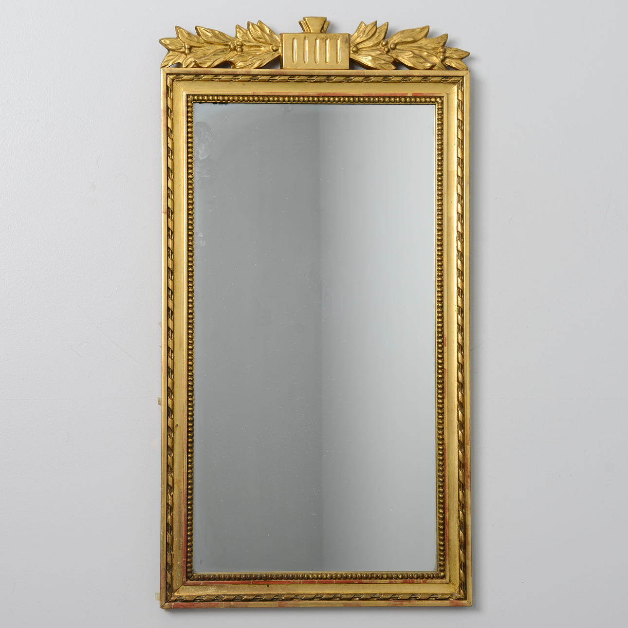 An empire-style mirror, gilt, AB Exportlist, 20th century.