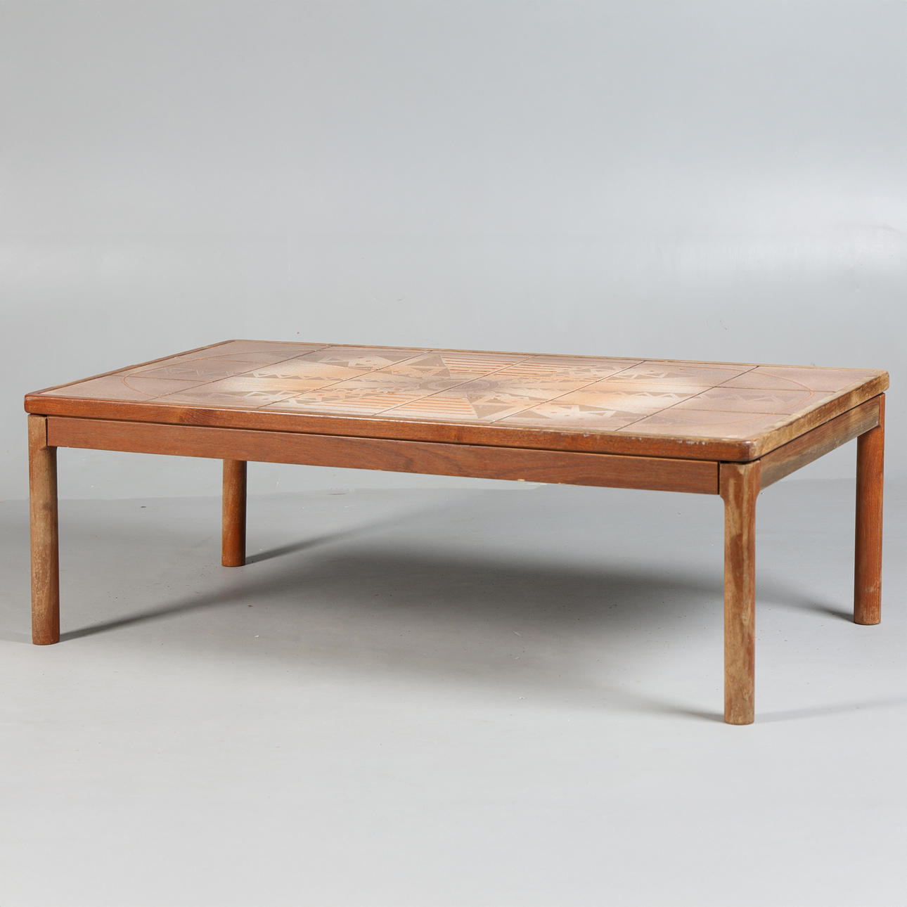 TRIOH. A TILE TOP COFFEE TABLE.