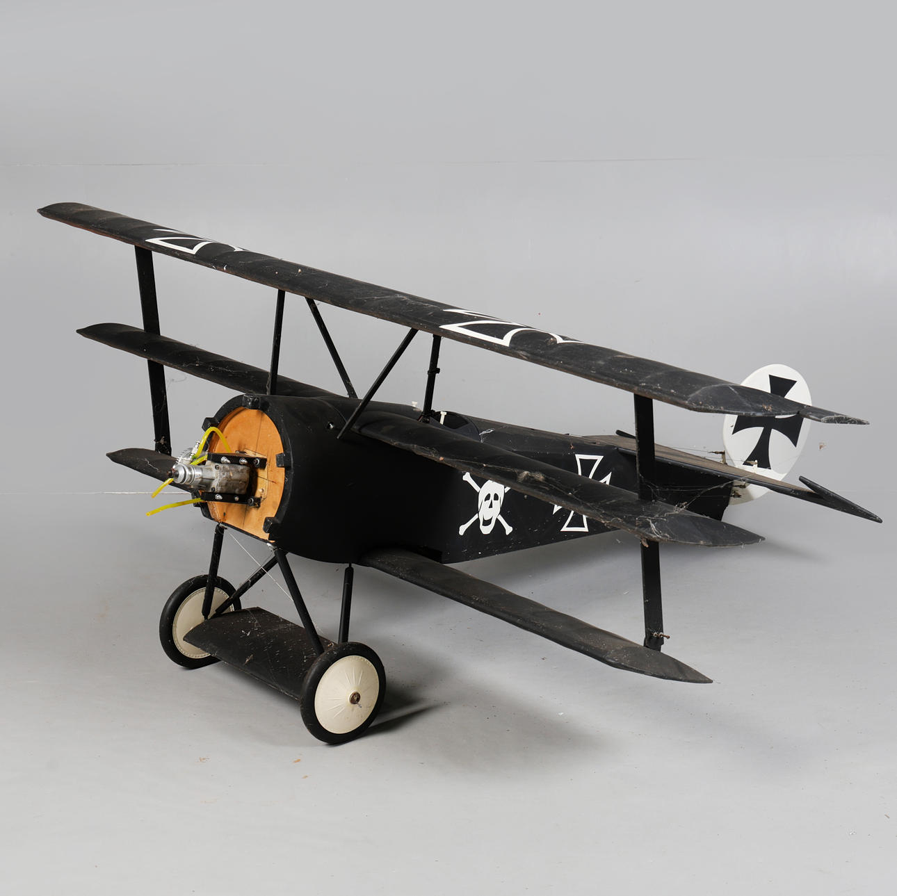 A MODEL FOKKER DR1 REMOTE CONTROL PLANE.