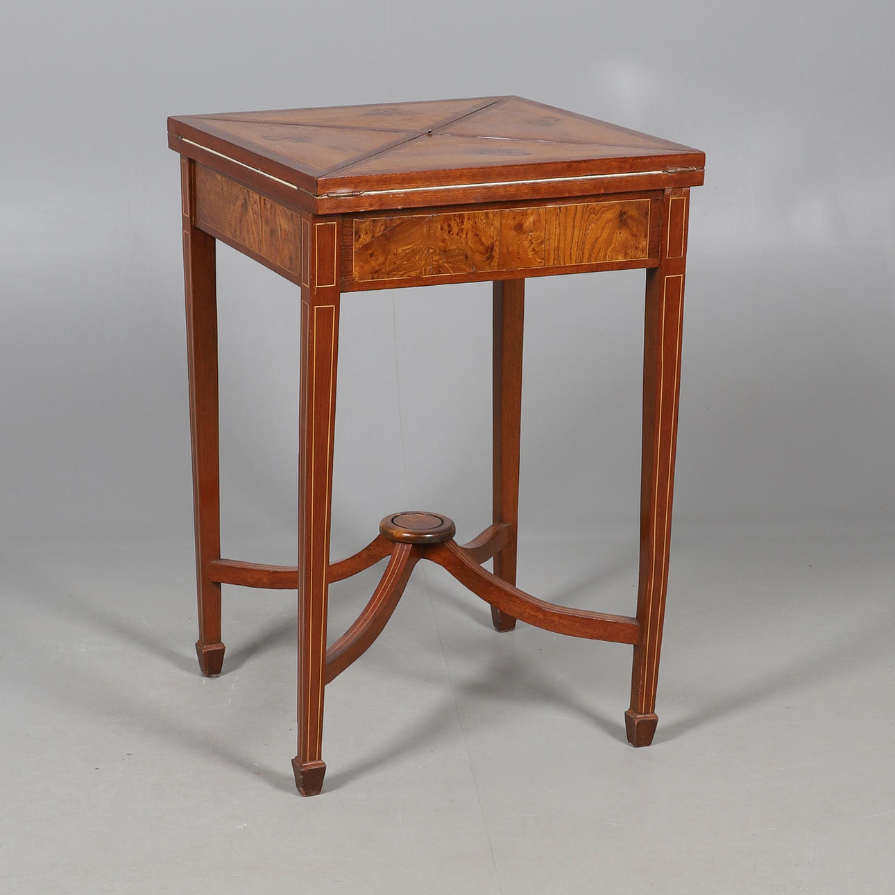 AN REPRODUCTION INLAID ENVELOPE CARD TABLE.