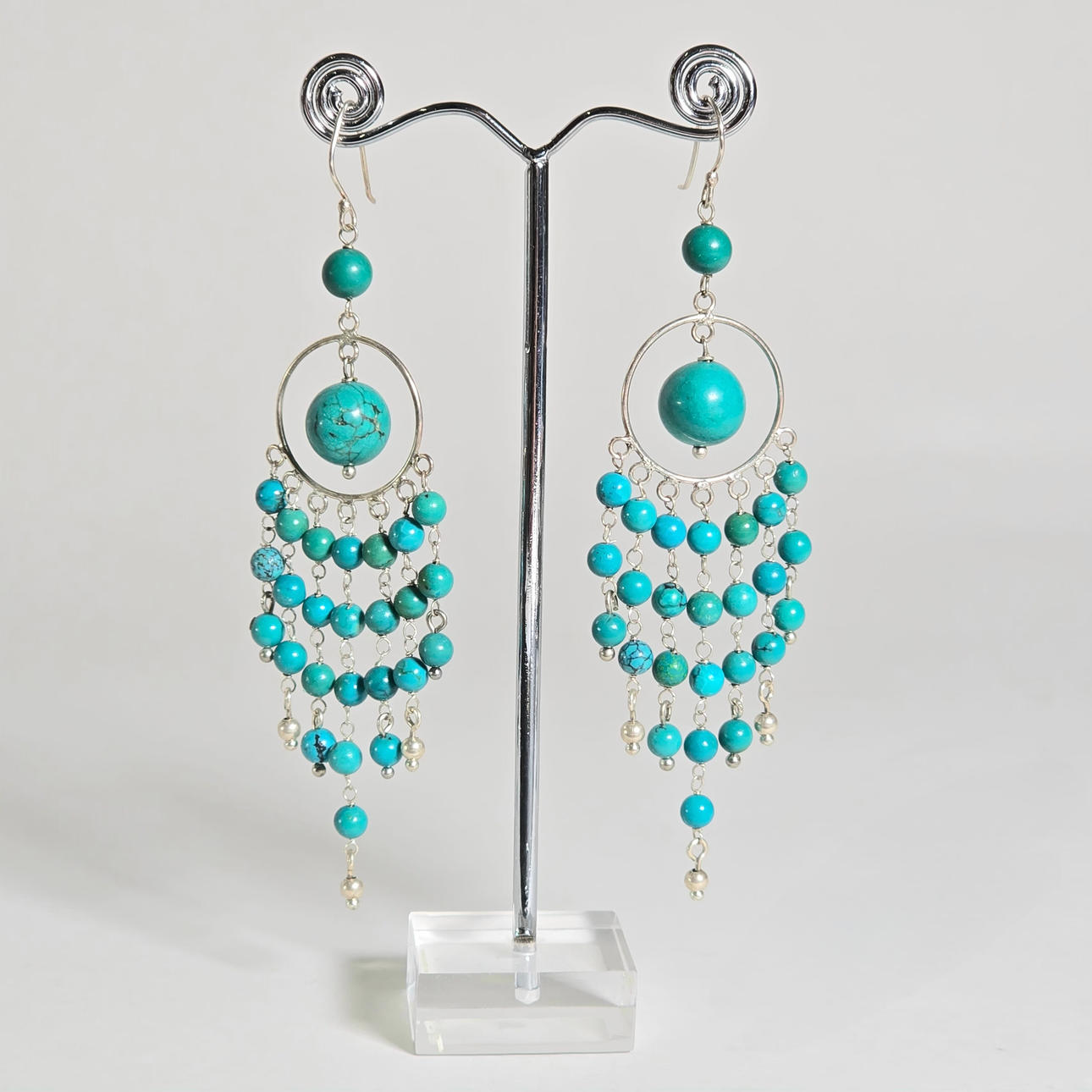 MOBILE EARRINGS IN SILVER AND TURQUOISE.