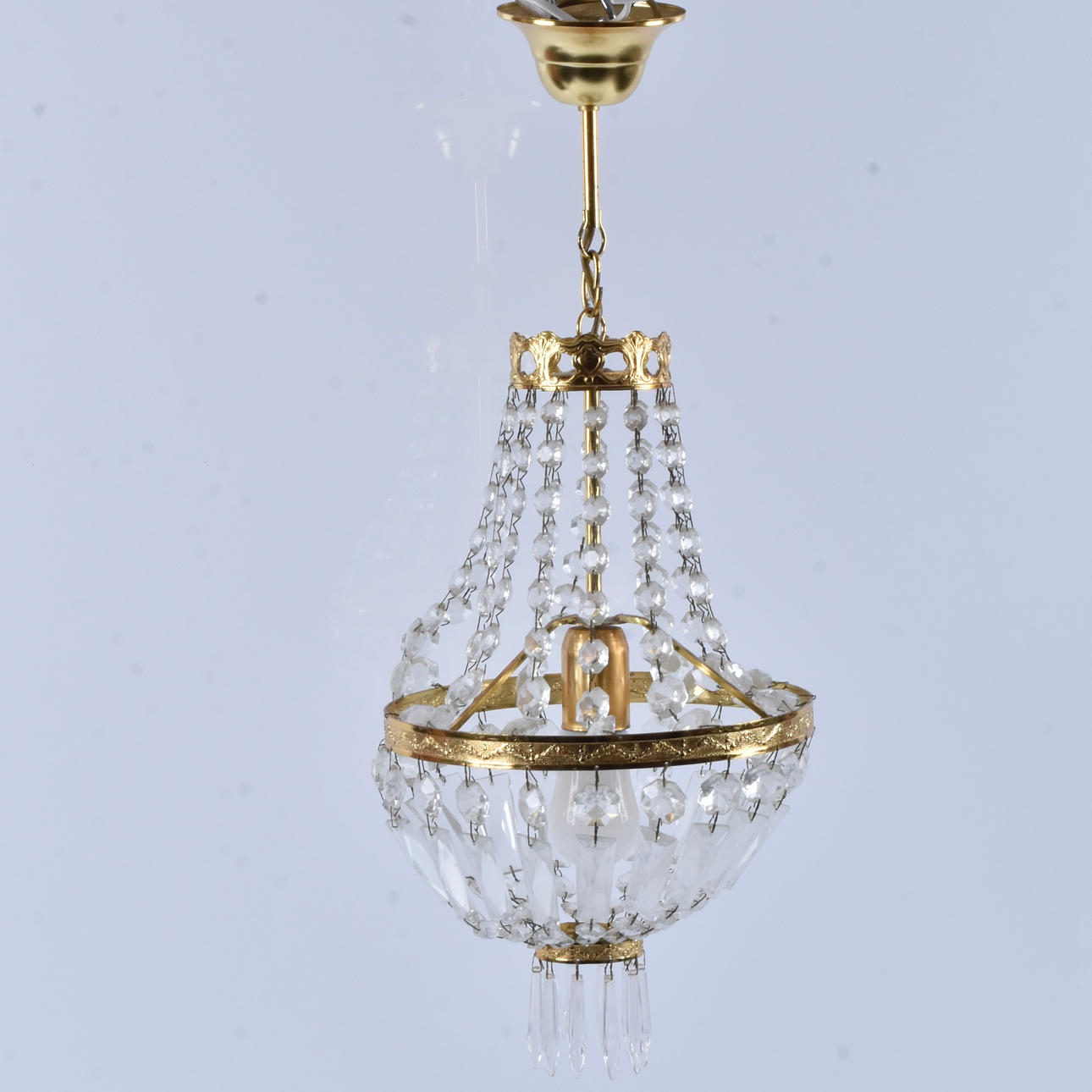 A brass hall lamp with prisms, 20th century.