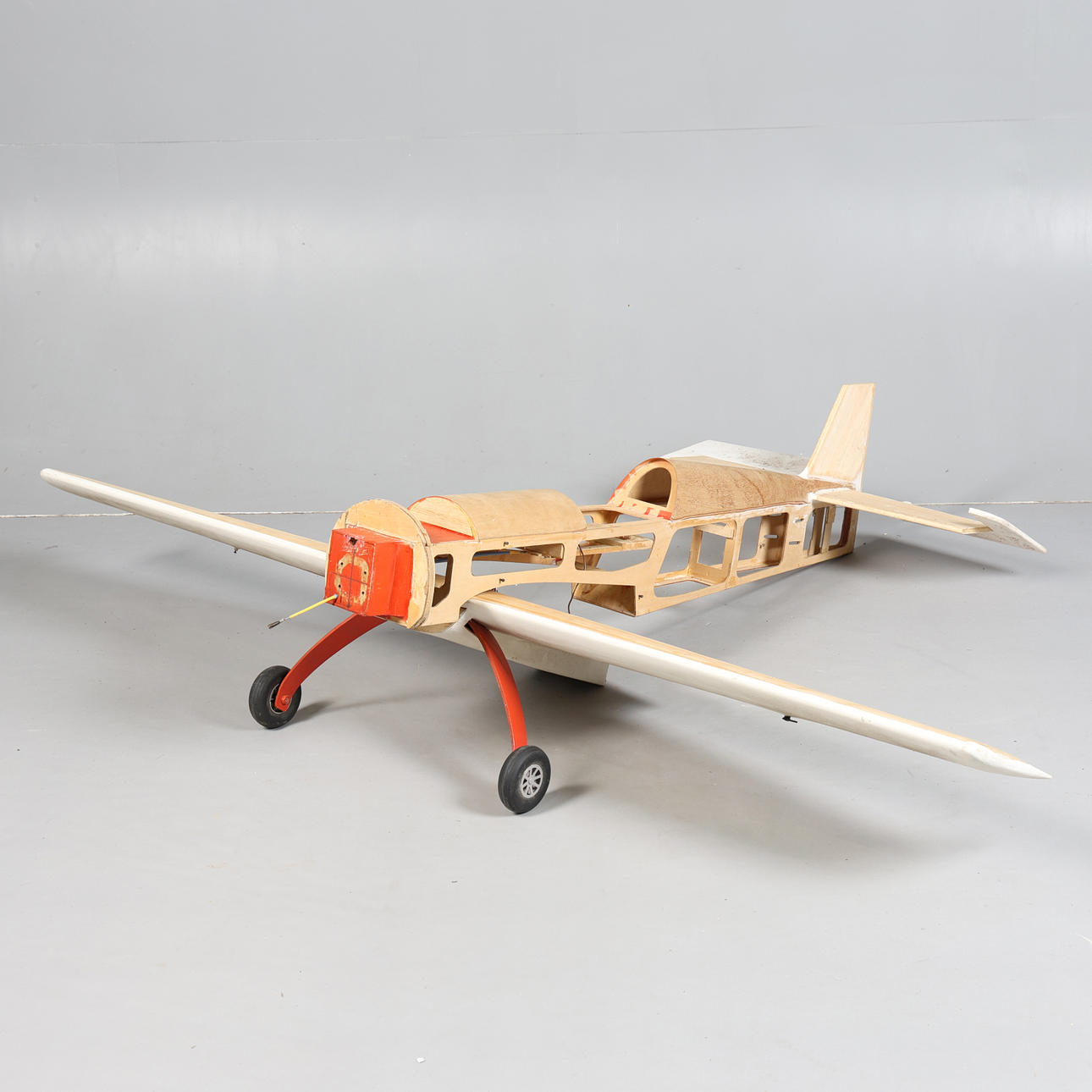 AN UNFINISHED MODEL AIRCRAFT.