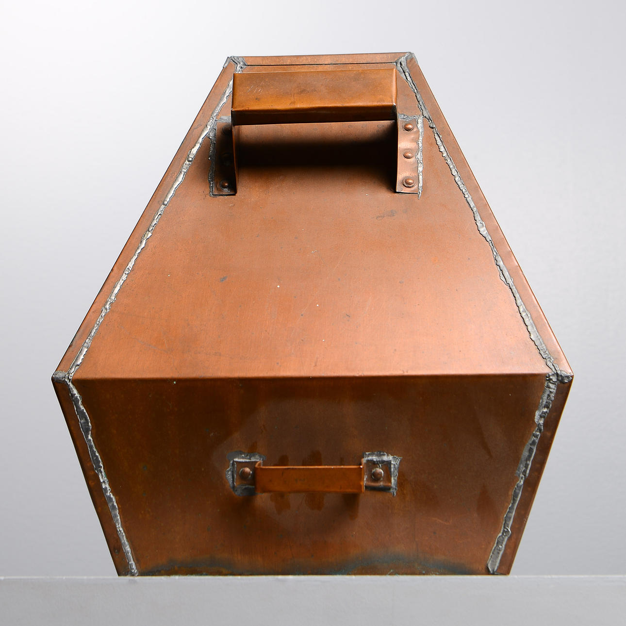 A copper charcoal collector, 20th century.