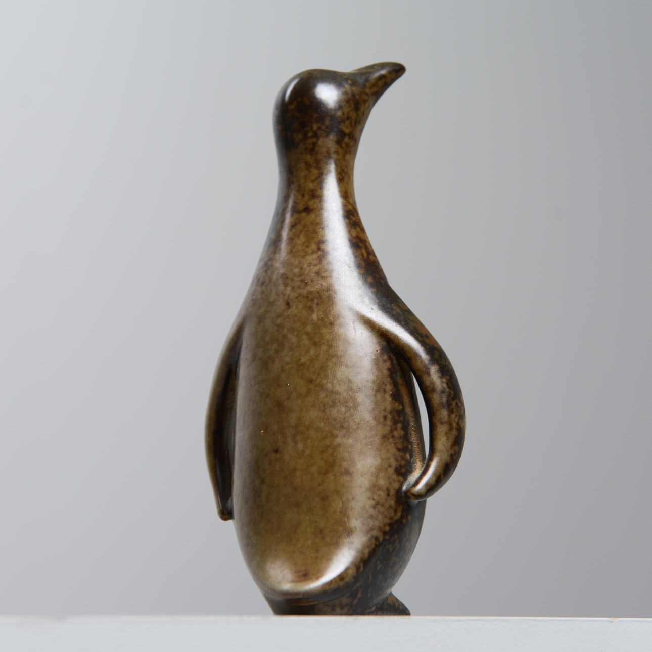 GUNNAR NYLUND. Penguin, stoneware, signed, Rörstrand.