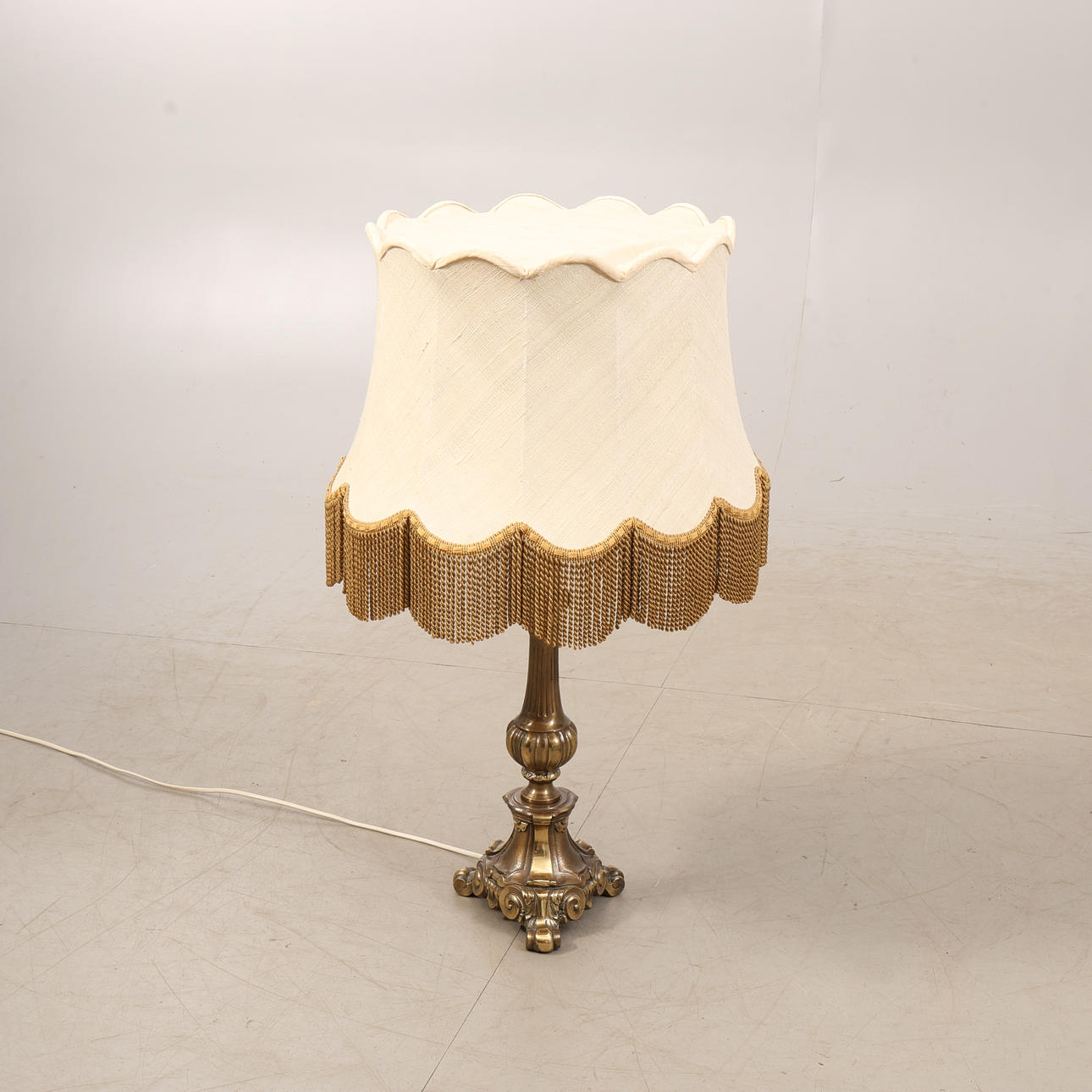 TABLE LAMP, brass, with textile shade.