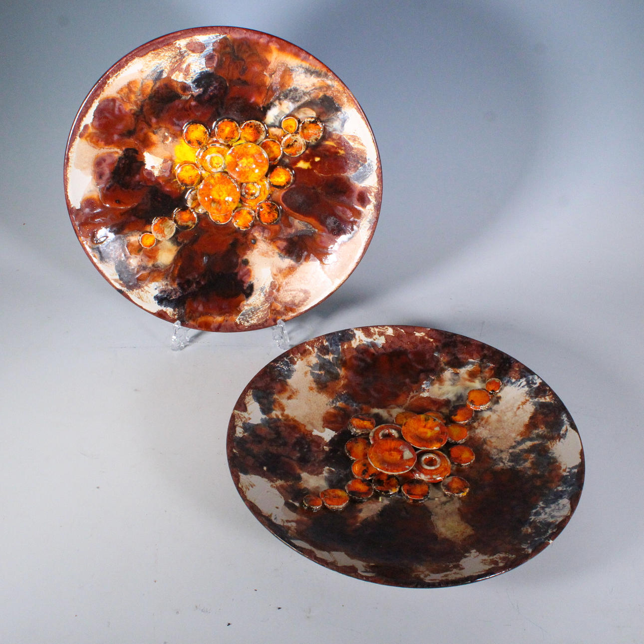 RUSCHA. Two wall plates/reliefs' mushrooms', ceramic, 1960s.