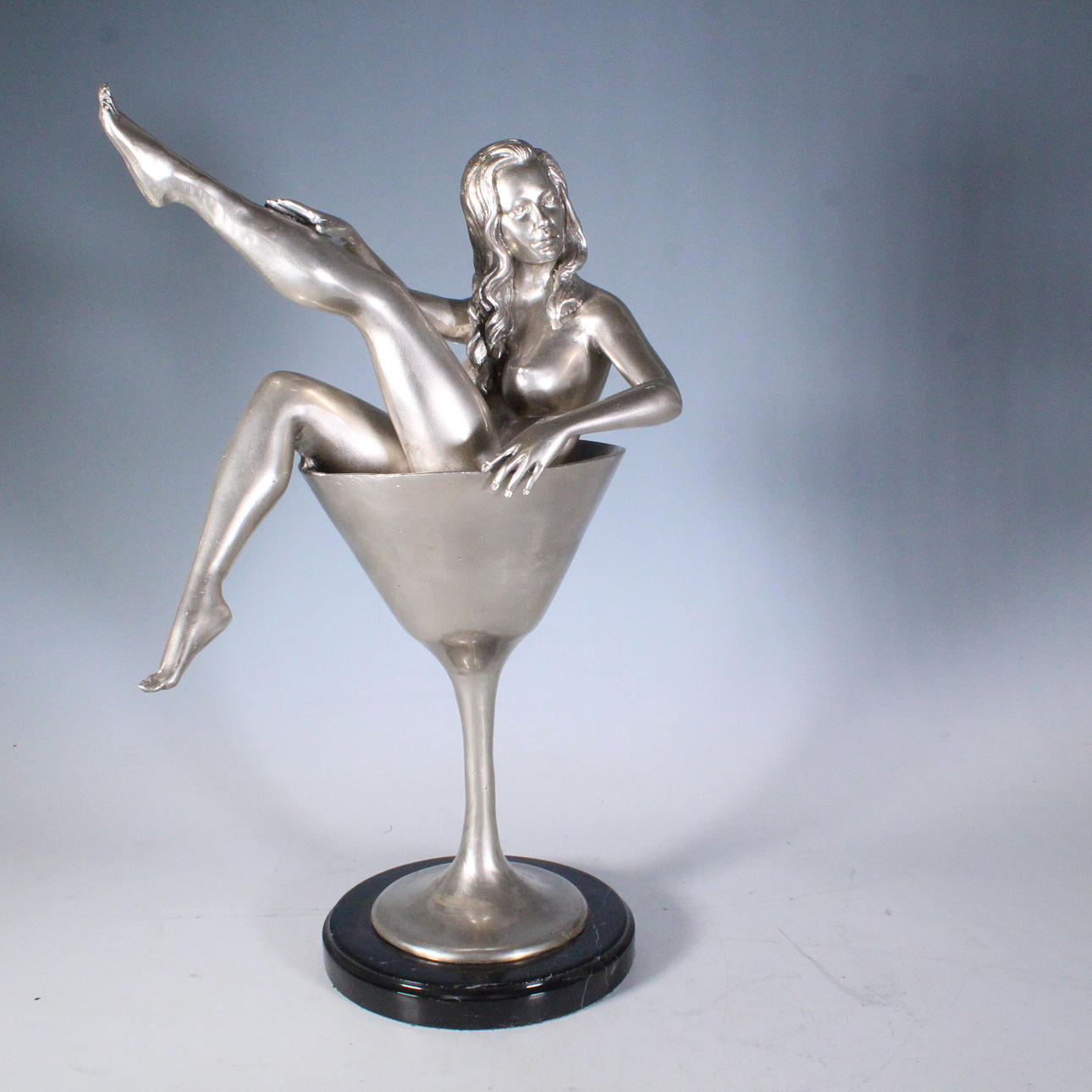 'Miss Martini, sculpture, marble base.