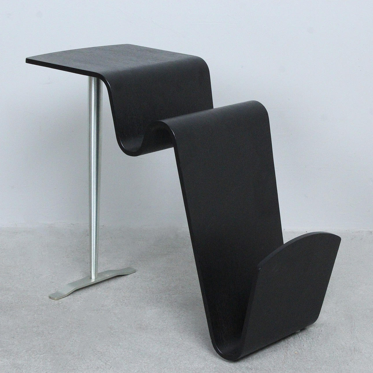 JAHN AAMODT. CONFORM. Sculptural magazine rack/side table, 'Funco' model.