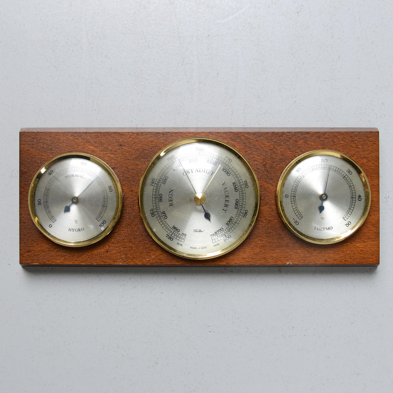 A FISCHER SHIP CLOCK & BAROMETER, second half of the 20th century.