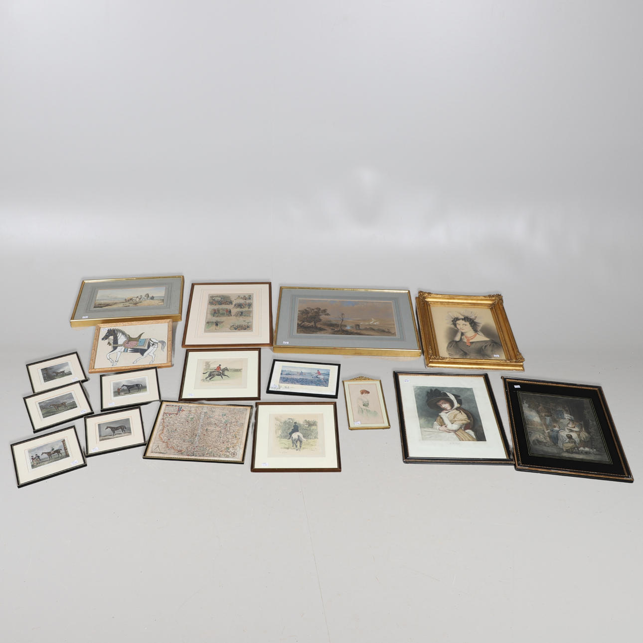 A FRAMED MAP AND PRINTS.