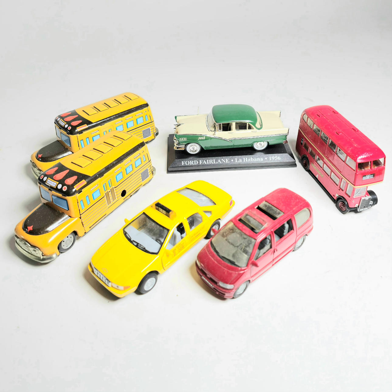 6 TOY VEHICLES.