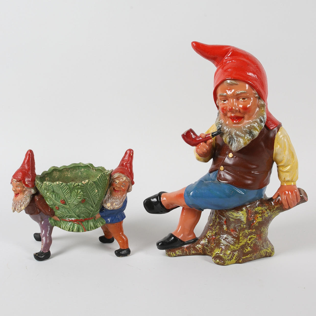 Two mid 20th century terracotta gnomes.