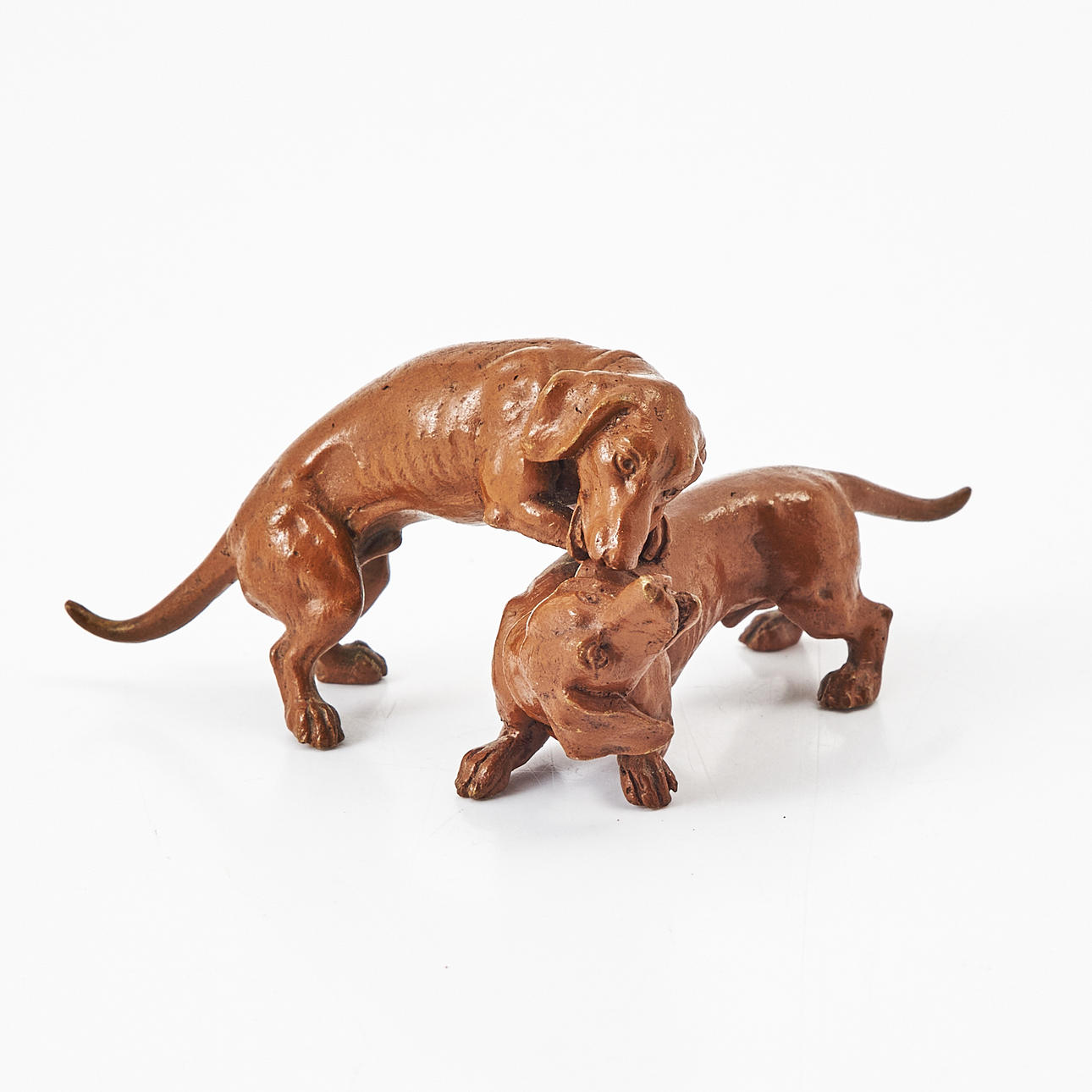 FIGURE GROUP, so called. A Viennese bronze, turn of the century 1900, two playing dachshunds.