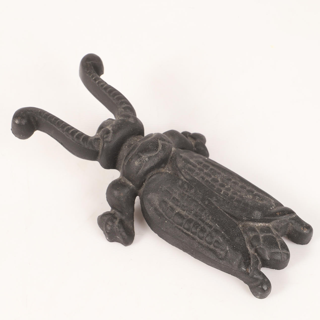 A cast iron boot jack, 20th century.