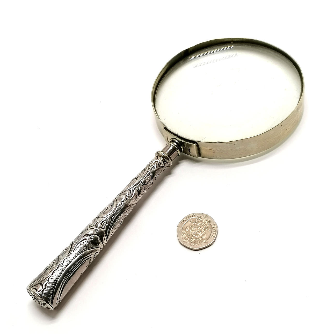 ANTIQUE SILVER HANDLED MAGNIFYING LENS.